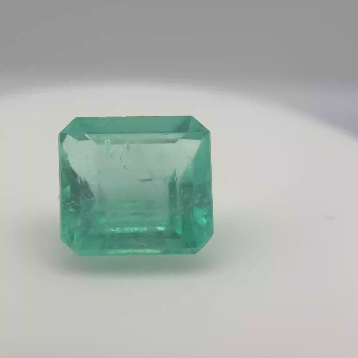 4.14 ct Vibrant Green Rectangular Emerald Cut Muzo Emerald Gemstone